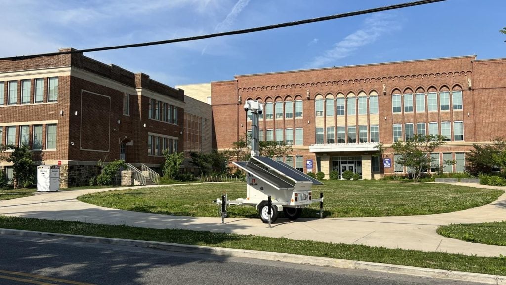 Public building with mobile surveillance trailer