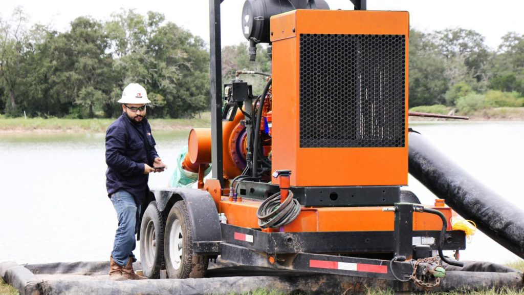 stallion employee with transfer pump
